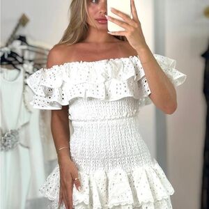 JESSICA BARA VEKA OFF THE SHOULDER RUFFLE TOP AND MINI SKIRT TWO PIECE SET.